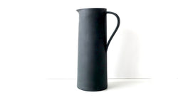tall slip cast porcelain pitcher or vase