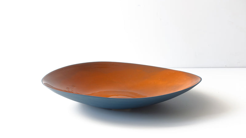 amorphous oval slip cast porcelain plate