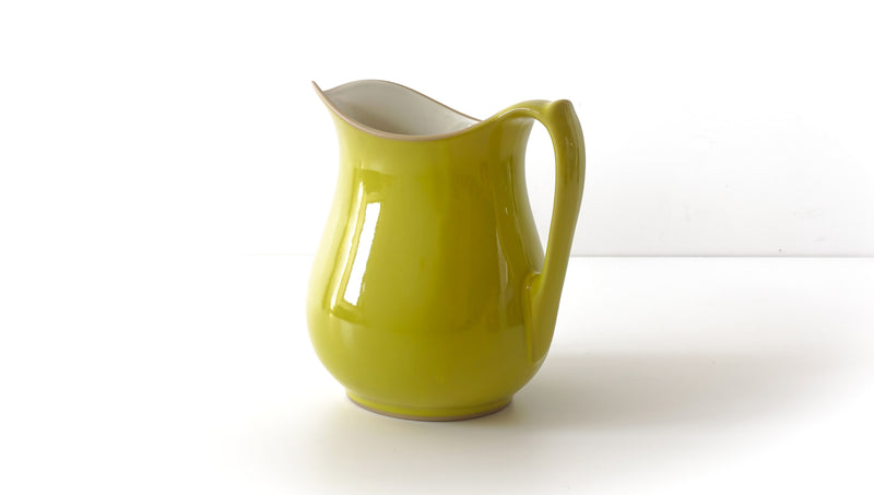 classic curvy slip cast yellow glazed porcelain jug